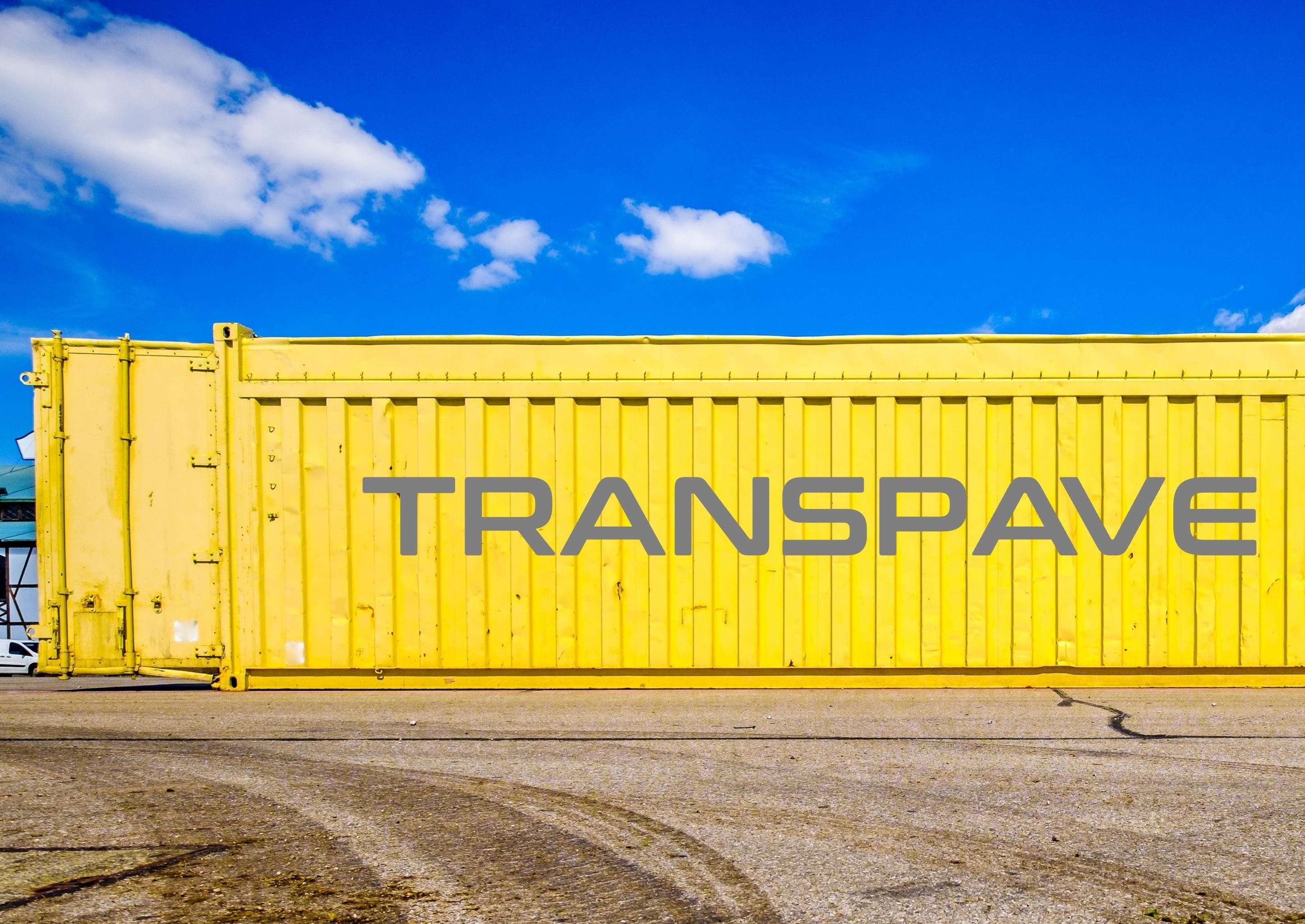 Image of a yellow shipping container with the Transpave logo on it